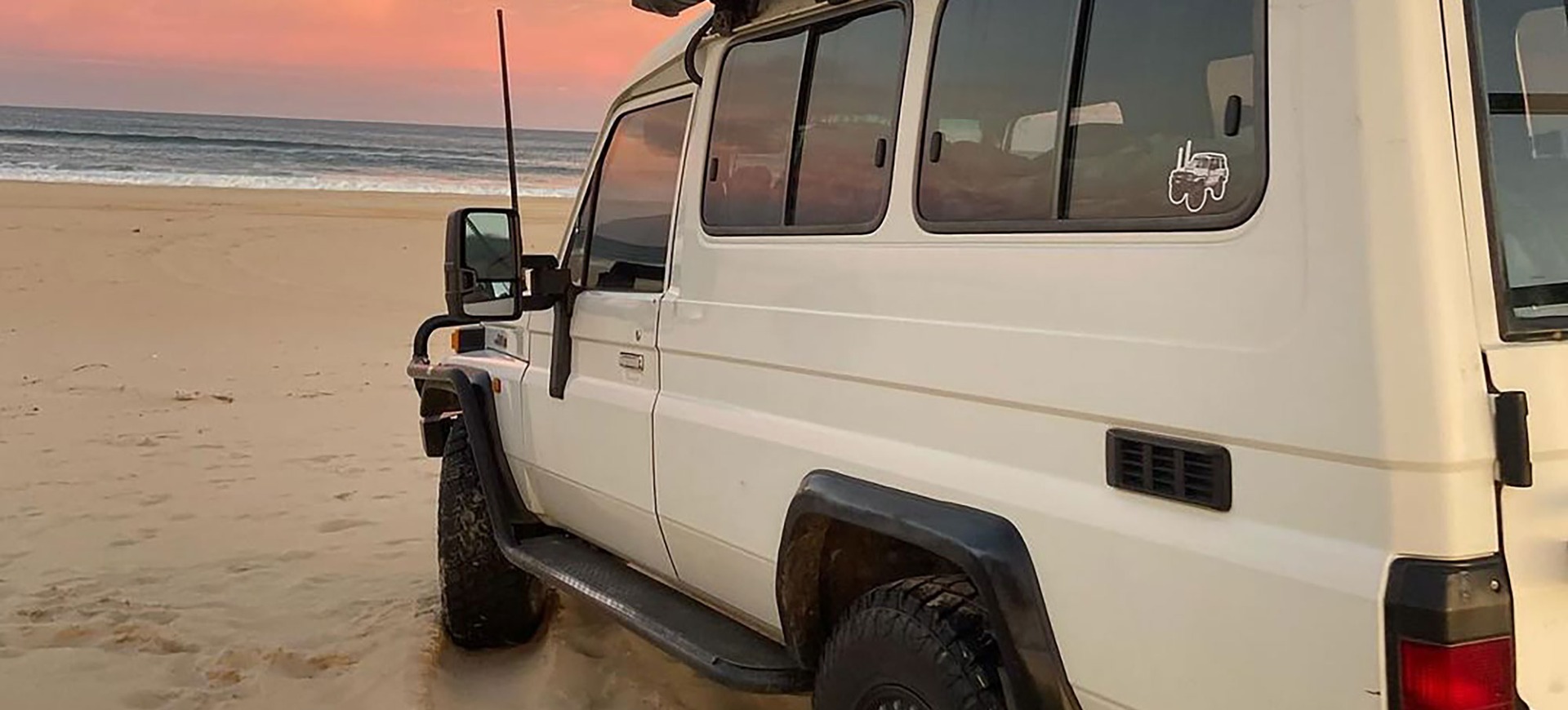 D22 Nissan Navara on a sandy beach